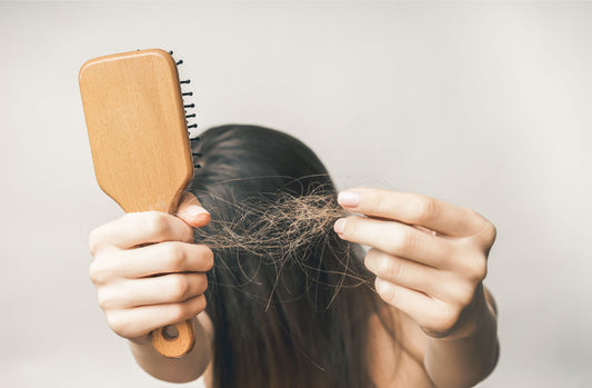 How to stop hair fall immediately at home for female (+ evidence-based tips)